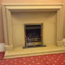 Original minster stone fireplace